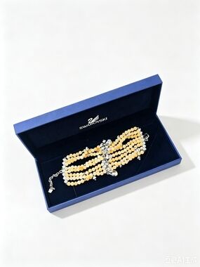 Swarovski Beige Beaded Multi-Strand Bracelet with Crystal Accents
